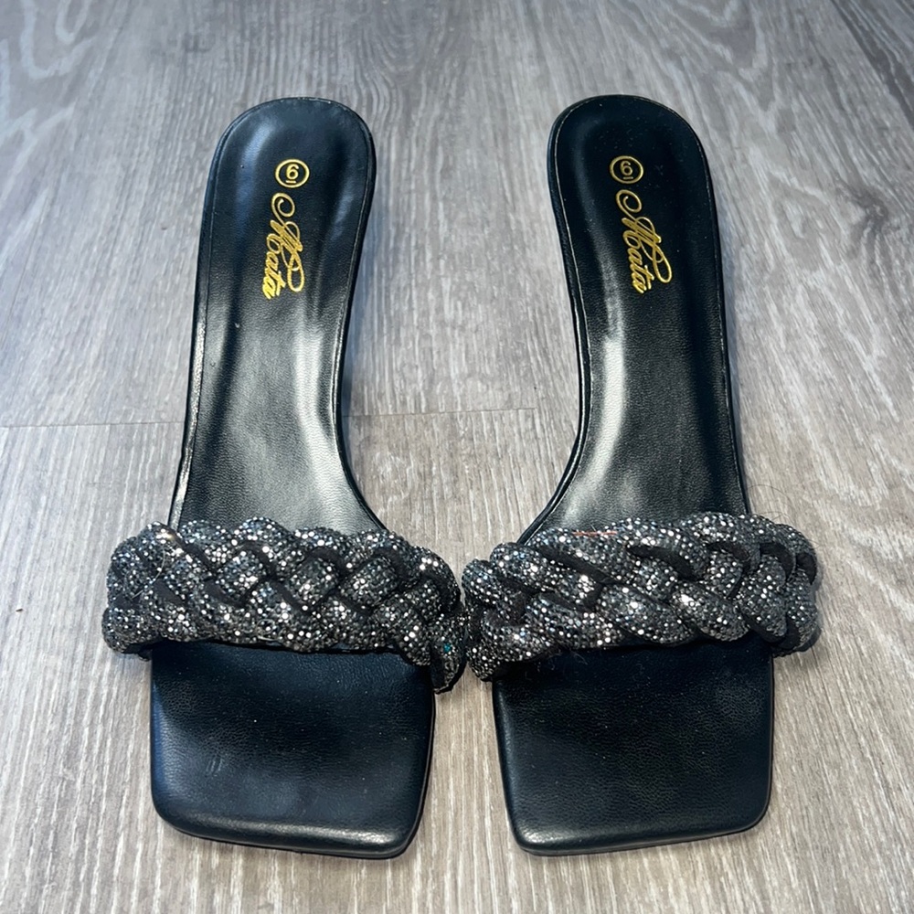 Black sparkly high heels